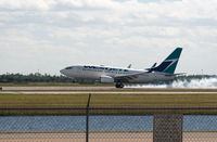 C-GWCN @ RSW - Touching down from Toronto - by Mauricio Morro