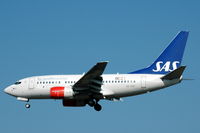 SE-DNT @ ESSA - SAS Boeing 737-600 about to land at Stockholm Arlanda airport. - by Henk van Capelle