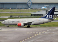 LN-RNO @ AMS - Taxi to runway L18 of Schiphol Airport - by Willem Göebel
