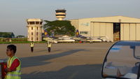 XY-ADZ @ VYYY - In the distance the two aircraft XY-ADZ and XY-AEQ at Yangon International Airport. They appear to have not been used for some time and are in dilapidated state, with growth of green moss-like material particularly near the tail sections. - by George Spark