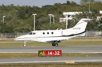 N414TE @ KSRQ - Raytheon Premier 1 (N414TE) departs Sarasota-Bradenton International Airport enroute to Eppley Airfield - by jwdonten