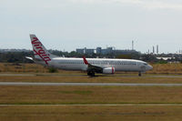 VH-YIO @ YSSY - At Sydney - by Micha Lueck