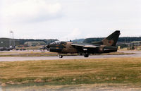5527 @ EGQS - Portuguese Air Force A-7P Corsair II of 304 Esquadron lining up on Runway 05 at RAF Lossiemouth in September 1993. - by Peter Nicholson