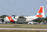 1502 @ KSRQ - USCG Clearwater 1502 performs training flight manuevers at Sarasota-Bradenton International Airport - by Jim Donten