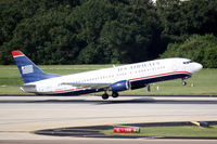 N438US @ KTPA - US Air Flight 1168 (N438US) departs Tampa International Airport enroute to Charlotte-Douglas International Airport - by Jim Donten