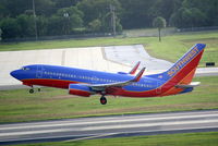 N271LV @ KTPA - Southwest Flight 840 (N271LV) departs Tampa International Airport enroute to Nashville International Airport - by Jim Donten