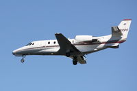 N592QS @ KSRQ - Cessna Citation Excel (N592QS) on approach to Sarasota-Bradenton International Airport following a flight from Fulton County Airport - by Jim Donten