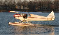 N3670N @ KAXN - Piper PA-12 Super Cruiser taxiing in to the seaplane dock. - by Kreg Anderson