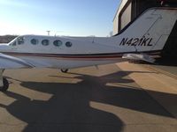 N421KL @ RVS - At RVS being push back to the hanger - by Joe