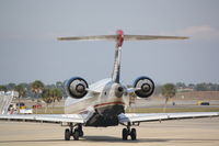 N912FJ @ KSRQ - US Air Flight 2687 operated by Mesa (N912FJ) prepares for flight at Sarasota-Bradenton International Airport - by Jim Donten