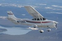 N7139X - Cessna Skylane in flight. - by Eddie Cannon