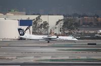 N420QX @ KLAX - DHC-8-400