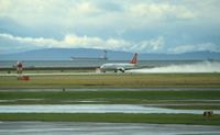 C-FANB @ CYVR - Air North flight 506 leaving YVR just after a rain shower. A couple of hours later it would land at YXY in gusty wind, snow and -28 degrees. - by Murray Lundberg