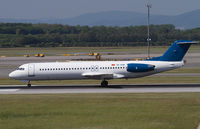 4O-AOM @ LOWW - Montenegro Airlines Fokker 100 - by Andreas Ranner