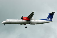 OY-KCE @ ESSA - An SAS Dash-8-400 landing at Stockholm Arlanda airport, Sweden. - by Henk van Capelle