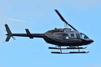 G-LVDC @ EGGW - 1989 Bell 206L-3, c/n: 51300 - by Terry Fletcher