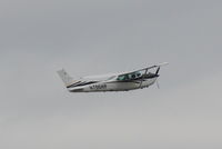N706HP @ KSRQ - Cessna Turbo Skylane (N706HP) departs Sarasota-Bradenton International Airport enroute to Lakeland-Linder Airport - by Jim Donten