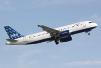 N558JB @ KSRQ - JetBlue Flight 346 Song Sung Blue (N558JB) departs Runway 14 at Sarasota-Bradenton International Airport enroute to John F Kennedy International Airport - by Jim Donten
