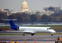N283SK @ KDCA - Taxi DCA, US Capitol in background - by Ronald Barker