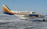 N125DP @ KAXN - A brightly colored Beech 99 from Bemidji Aviation taxiing out for departure.
