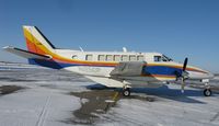 N125DP @ KAXN - A Beech 99 of Bemidji Aviation Services resting between cargo runs during the holiday season.