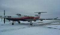 N469HP @ KAXN - Pilatus PC-12 resting at the fuel pumps. I only had my cell phone on hand this day, which resulted in a lower image quality. - by Kreg Anderson