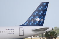 N706JB @ KSRQ - Jet Blue Airbus A320 (N706JB) prepares for flight at Sarasota-Bradenton International Airport - by Jim Donten