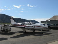 N29CC @ SZP - 1977 Beech 58P BARON, two Turbosupercharged Continental TSIO-520-LB1C 310 Hp each, pressurized to 3.6 psi differential, shoulder harnesses front seats, props off for maintenance - by Doug Robertson