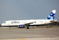 N562JB @ KSRQ - JetBlue Flight 341 The Name is Blue, JetBlue (N562JB) pulls into the gate at Sarasota-Bradenton International Airport - by Jim Donten