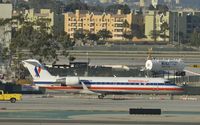 N464SW @ KLAX - Taxiing to gate - by Todd Royer