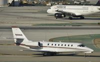 N308QS @ KLAX - Taxiing to parking - by Todd Royer
