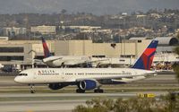 N614DL @ KLAX - Taxiing to gate - by Todd Royer