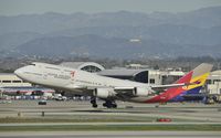 HL7418 @ KLAX - Departing LAX - by Todd Royer