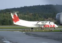 C-FACT @ CYCD - De Havilland Canada DHC-8-311 (Dash 8) of Buzz at Nanaimo Airport, Cassidy BC - by Ingo Warnecke