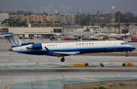 N744SK @ KLAX - UA Express CL700 landing in LAX - by FerryPNL