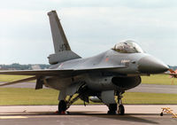 J-876 @ MHZ - F-16A Falcon, callsign Orange, of 323 Squadron Royal Netherlands Air Force on the flight-line at the 1997 RAF Mildenhall Air Fete. - by Peter Nicholson