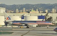 N338AA @ KLAX - Taxiing to gate - by Todd Royer
