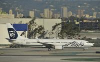 N523AS @ KLAX - Taxiing to gate - by Todd Royer