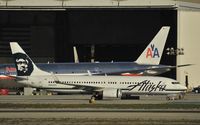 N524AS @ KLAX - Taxiing to gate - by Todd Royer