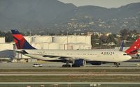 N859NW @ KLAX - Taxiing to gate - by Todd Royer