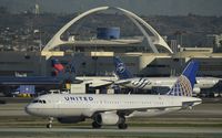 N497UA @ KLAX - Taxiing to gate - by Todd Royer