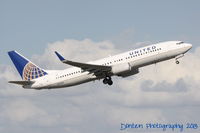 N13248 @ KSRQ - United Flight 1190 (N13248) departs Sarasota-Bradenton International Airport enroute to Chicgo-O'Hare International Airport - by Donten Photography