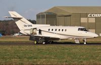 5N-BMR @ EGHH - Receiving attention at JETS - by John Coates