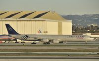 B-6053 @ KLAX - Taxiing to gate - by Todd Royer