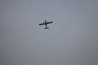 N469TS @ N469TS - Sky divers leaving N469TS at 5000 feet - by Ronald Barker