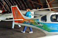 OH-XJP @ EFPI - Lancair 320 [169] Piikajarvi~OH 15/05/2003. Showing the rear art work on this side of the aircraft. - by Ray Barber