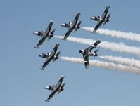 N137EM - 2011 Black Diamond Jet Team over Cocoa Beach - by Florida Metal