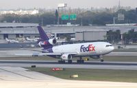 N316FE @ KFLL - MD-10-30F
