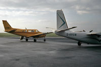 G-AWOI @ EGGP - Beech 65-B80 Queenair owned by British Domestic Appliances at Liverpool Airport in 1978. Parked next to Aero Commander 500B G-ARGW. - by Harry Longden