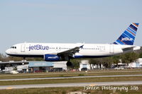 N639JB @ KSRQ - JetBlue Flight 1187 A Little Blue Will Do (N639JB) arrives on Runway 32 at Sarasota-Bradenton International Airport following a flight from Boston-Logan International Airport - by Donten Photography